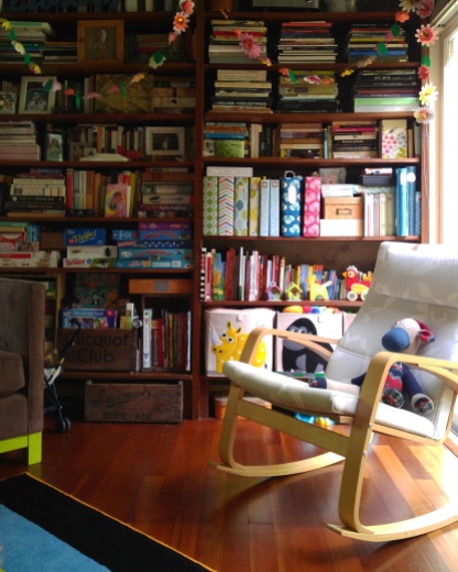 My daughters' room is cozy with an ever increasing library of books, games and toys.